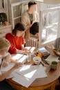 Girl in Red Shirt Sitting on Chair