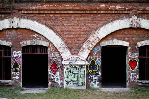 Graffiti on an Old Red Brick Building 