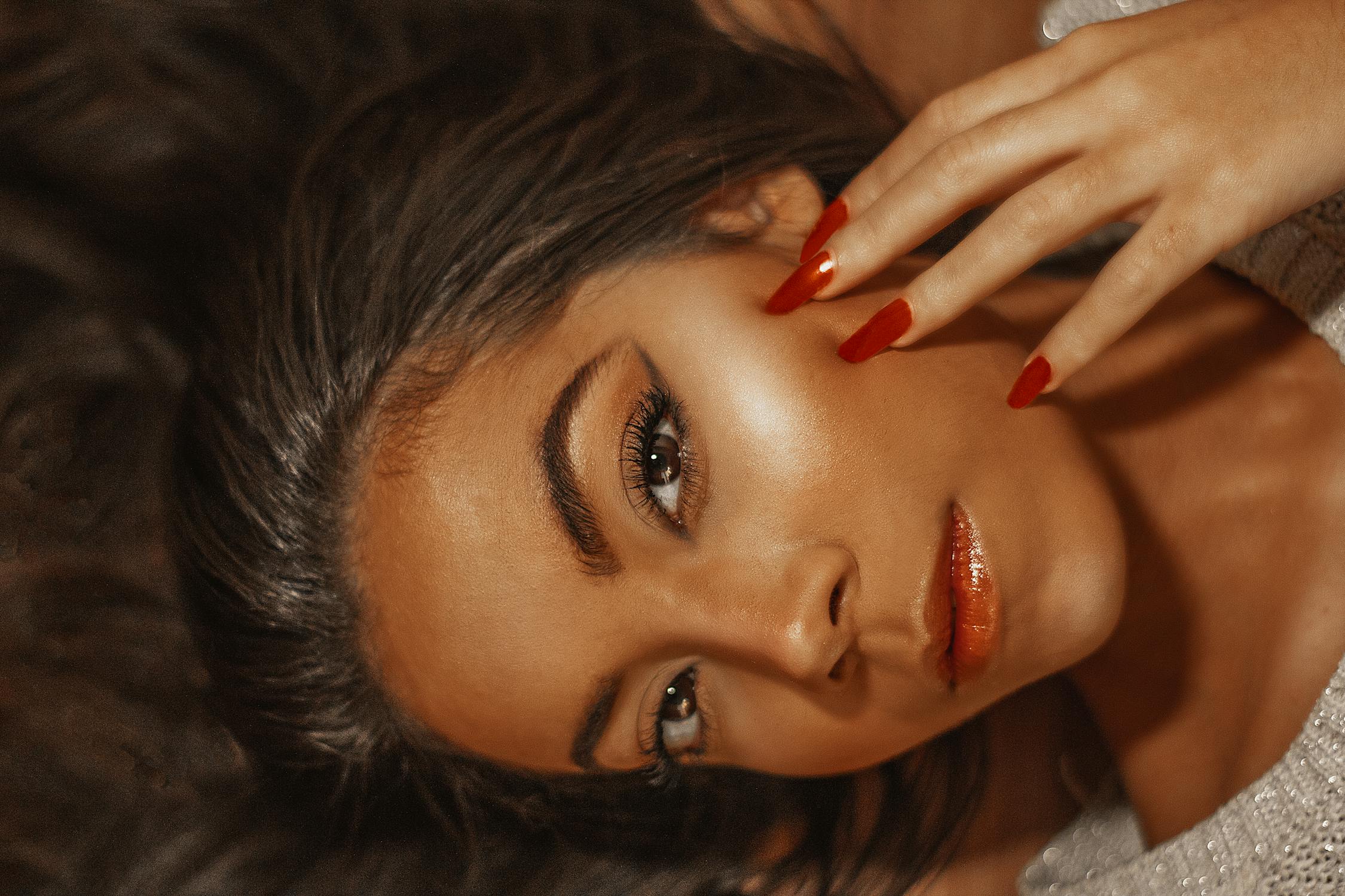 Beautiful Woman with Red Nails