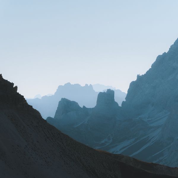 Dolomite peaks in morning fog — photo by Valdemaras D. on Pexels