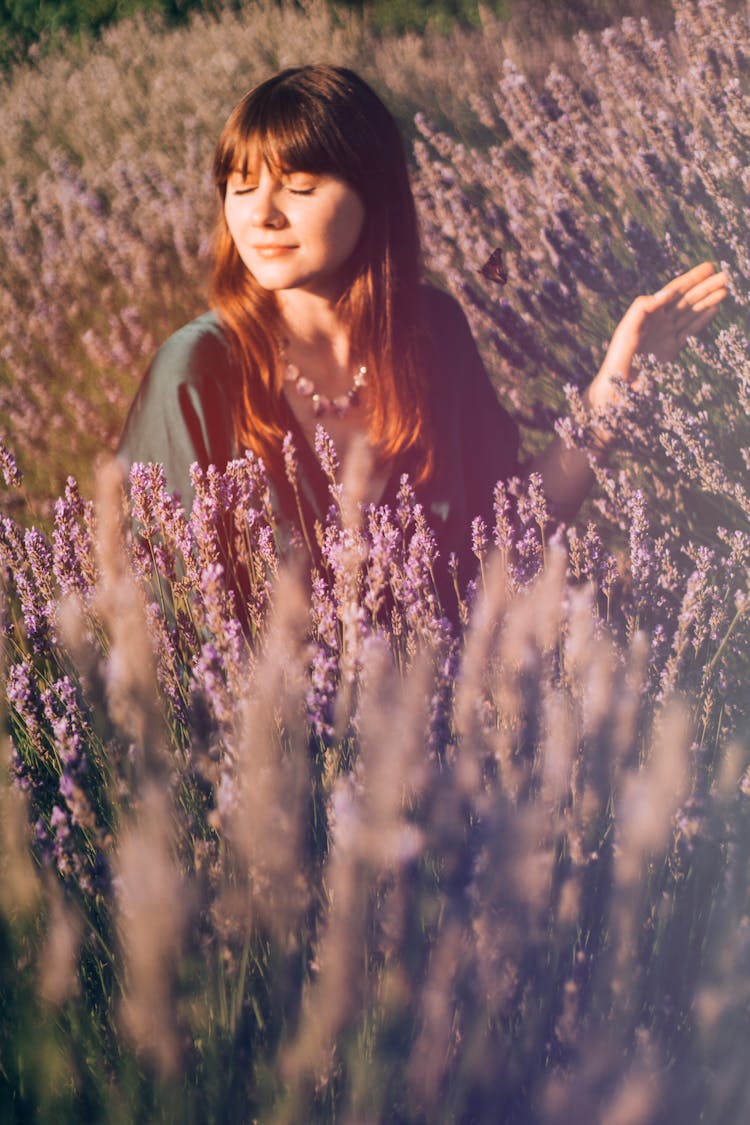 Joyful Young Woman In Field Of Lavender