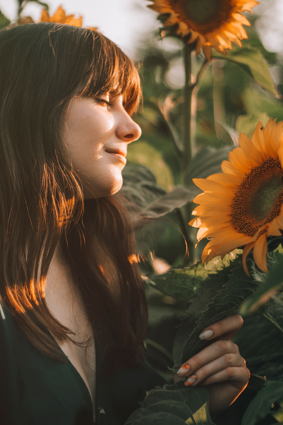 Woman in morning sunlight feeling like herself again while healing from betrayal trauma