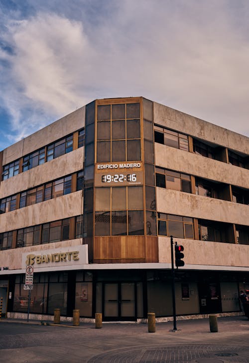 Photograph of a Building with a Digital Clock