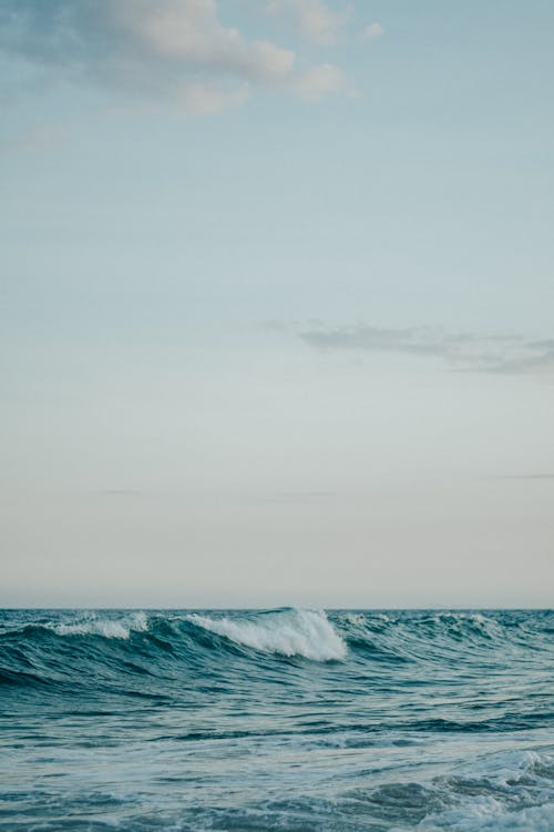 Photograph of a Body of Water with Waves