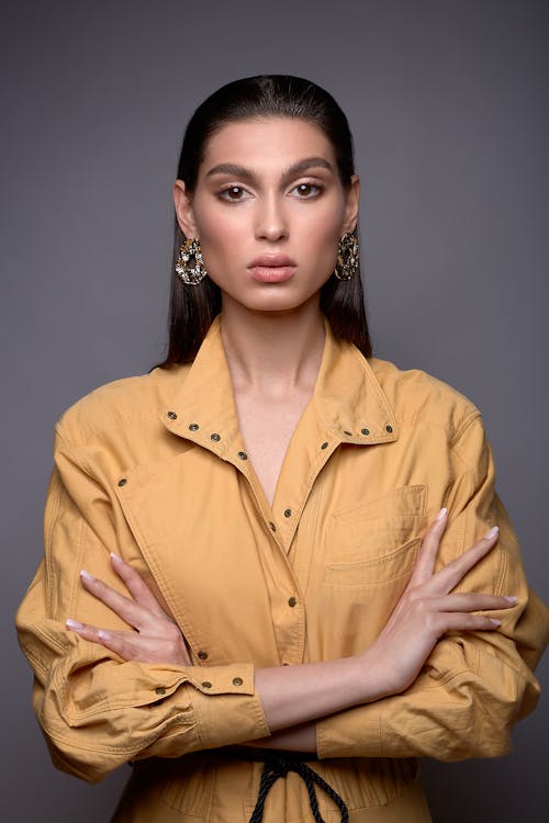 Woman Wearing Yellow Outfit Posing