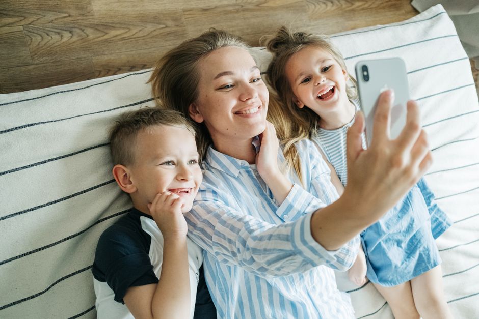 Photo by Ivan S on Pexels A joyful mother taking a selfie with her happy son and daughter indoors. - Photo by Ivan S on Pexels
