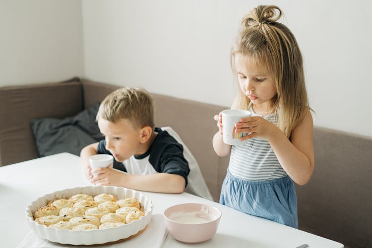 Siblings Having Breakfast Together