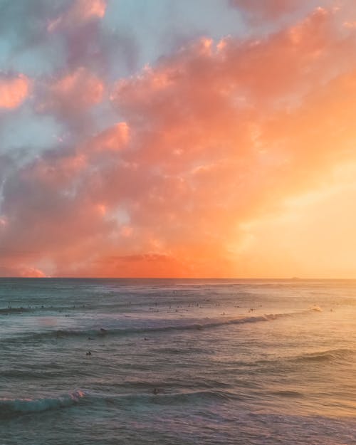 Body of Water Under the Dramatic Sky