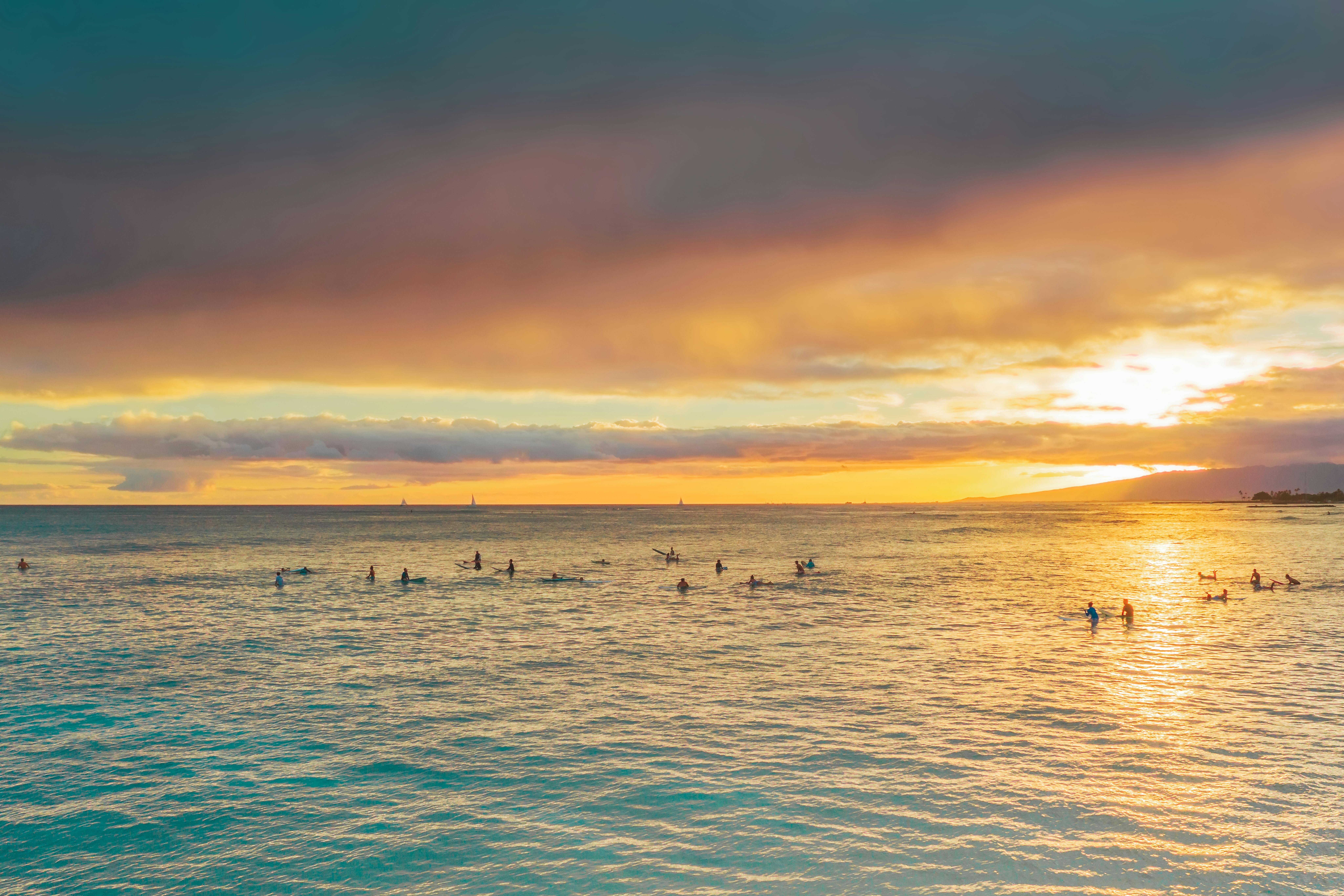 person enjoying sunset - How to prolong battery
