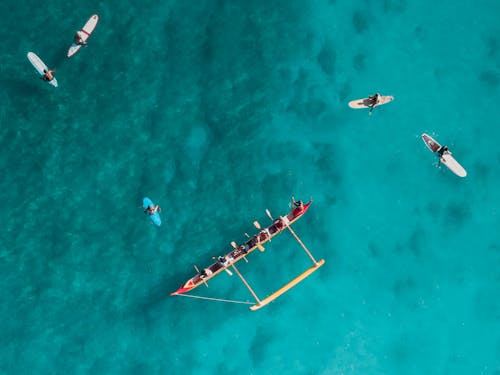 Free Aerial Photography of Athletes Riding on a Canoe and Kayaks Stock Photo