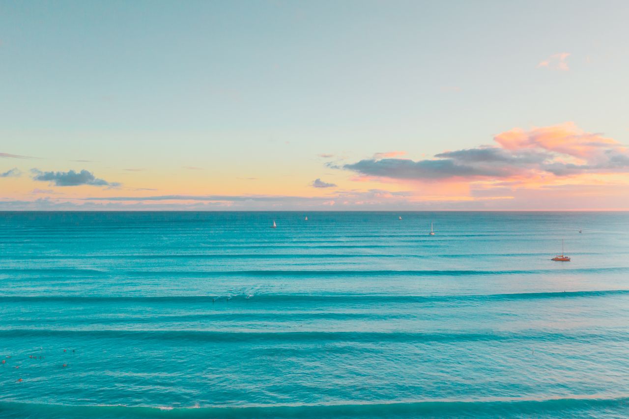 stunning aerial view of the tranquil ocean during sunset in waimea haw
