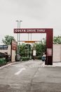 A Car Passing through Costa Drive Thru