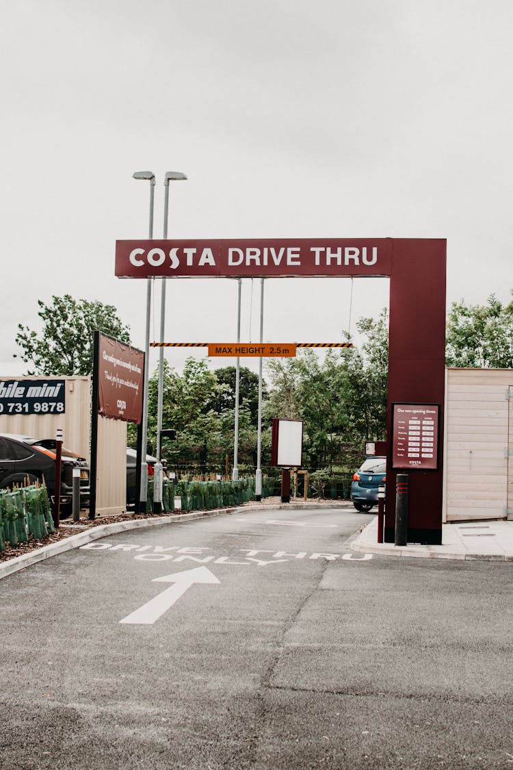 A Car Passing Through Costa Drive Thru