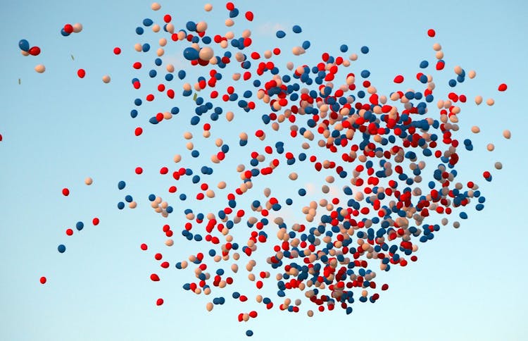 Colorful Balloons Released In The Sky