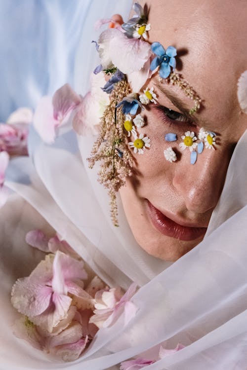 Free Woman in White Wedding Dress With Blue and Yellow Flower Headdress Stock Photo