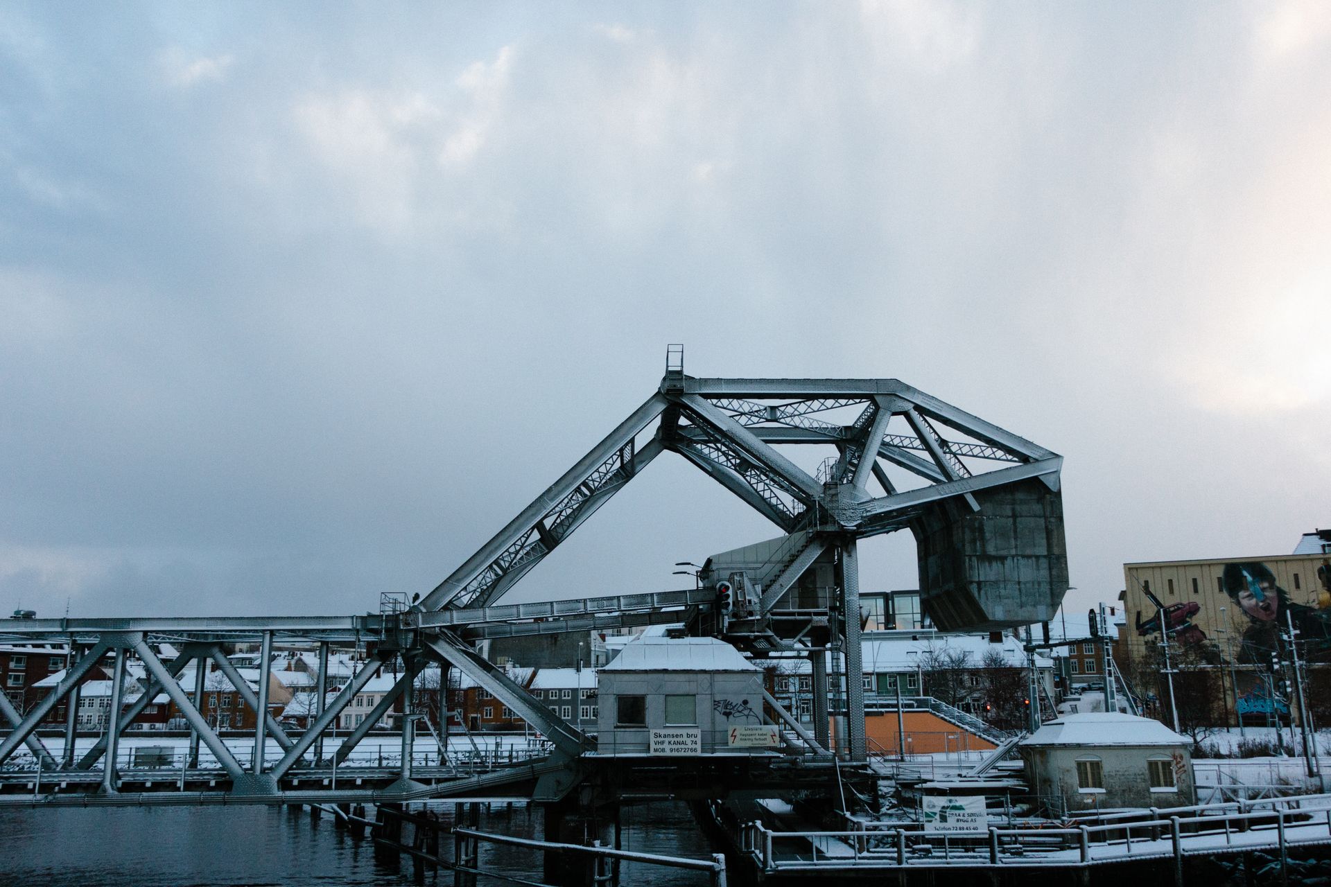 A Bridge made out of Steel Beams under a Cloudy Sky