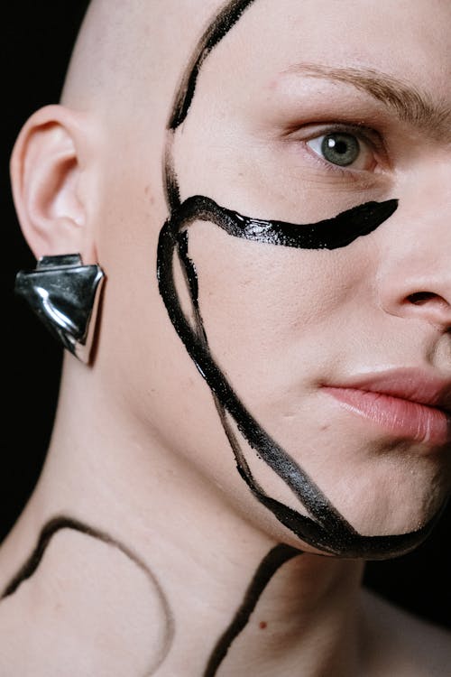 Woman With Black and Silver Earring