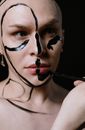 Woman With Black and White Paint on Face