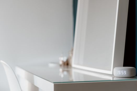 White Electronic Device on the Table