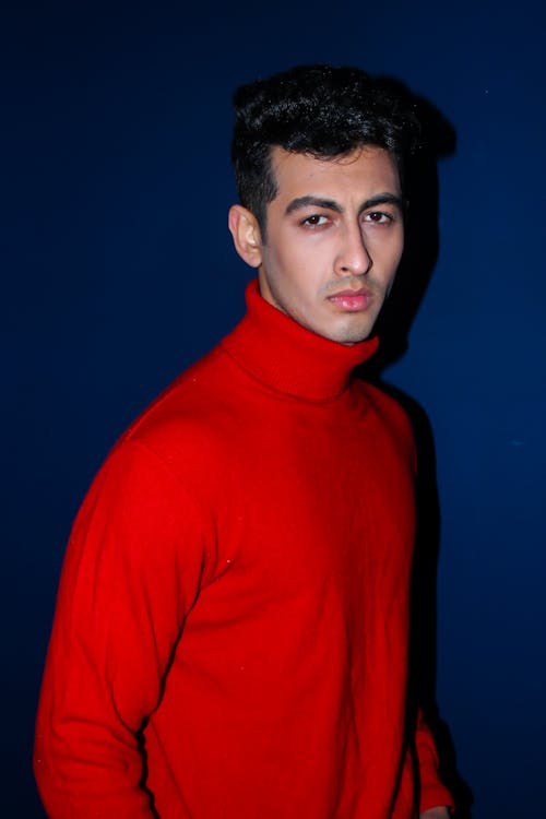 Free A Man in Red Turtleneck Long Sleeve Shirt Stock Photo