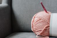 Yarn for knitting on sofa at home