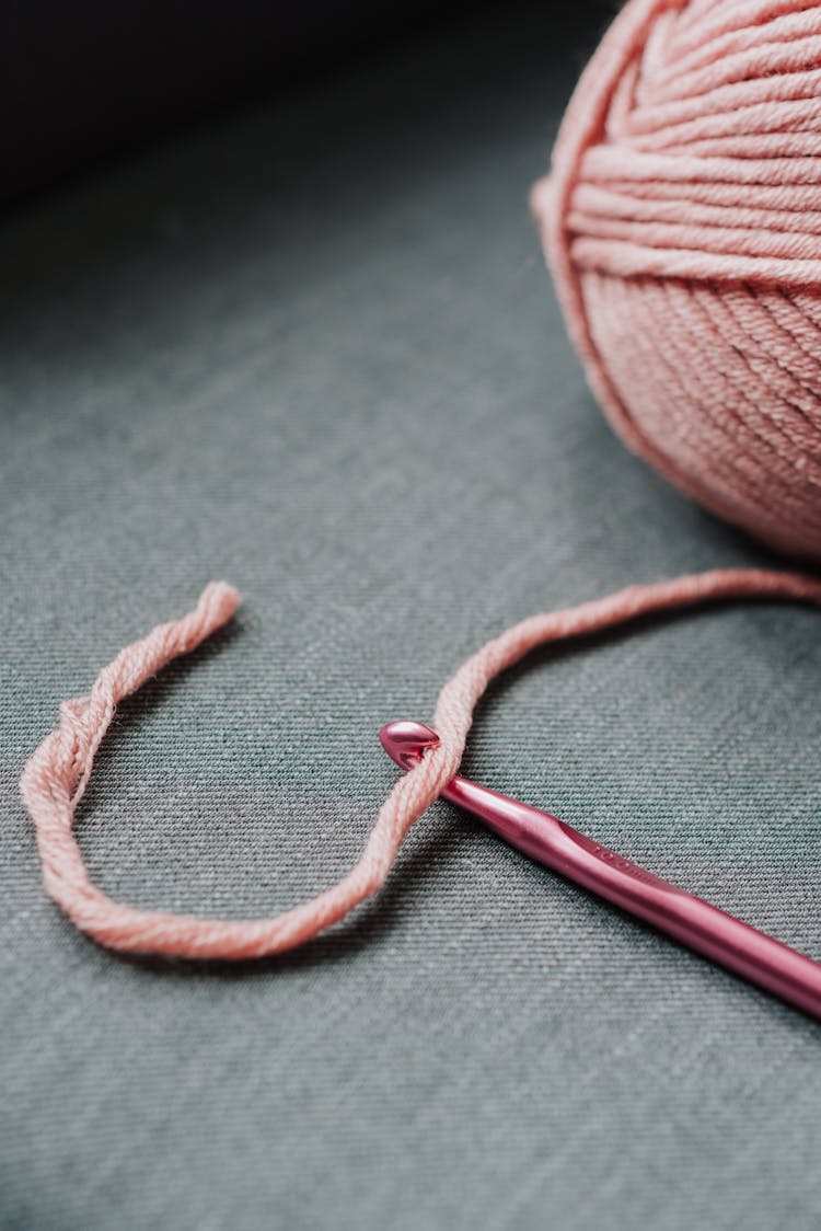 Pink Yarn And Crochet Hook