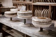 Dirty throwing wheels in modern workshop