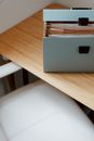 Opened briefcase for documents placed on table