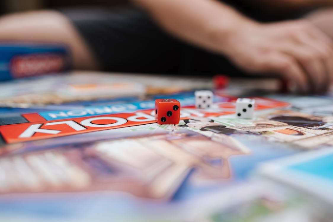 Selective Focus of Dice on Monopoly Board Game 