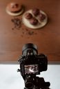 Camera with photo of delicious muffins on display