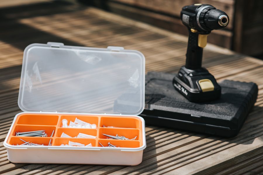 Toolbox and cordless drill used for professional furniture assembly