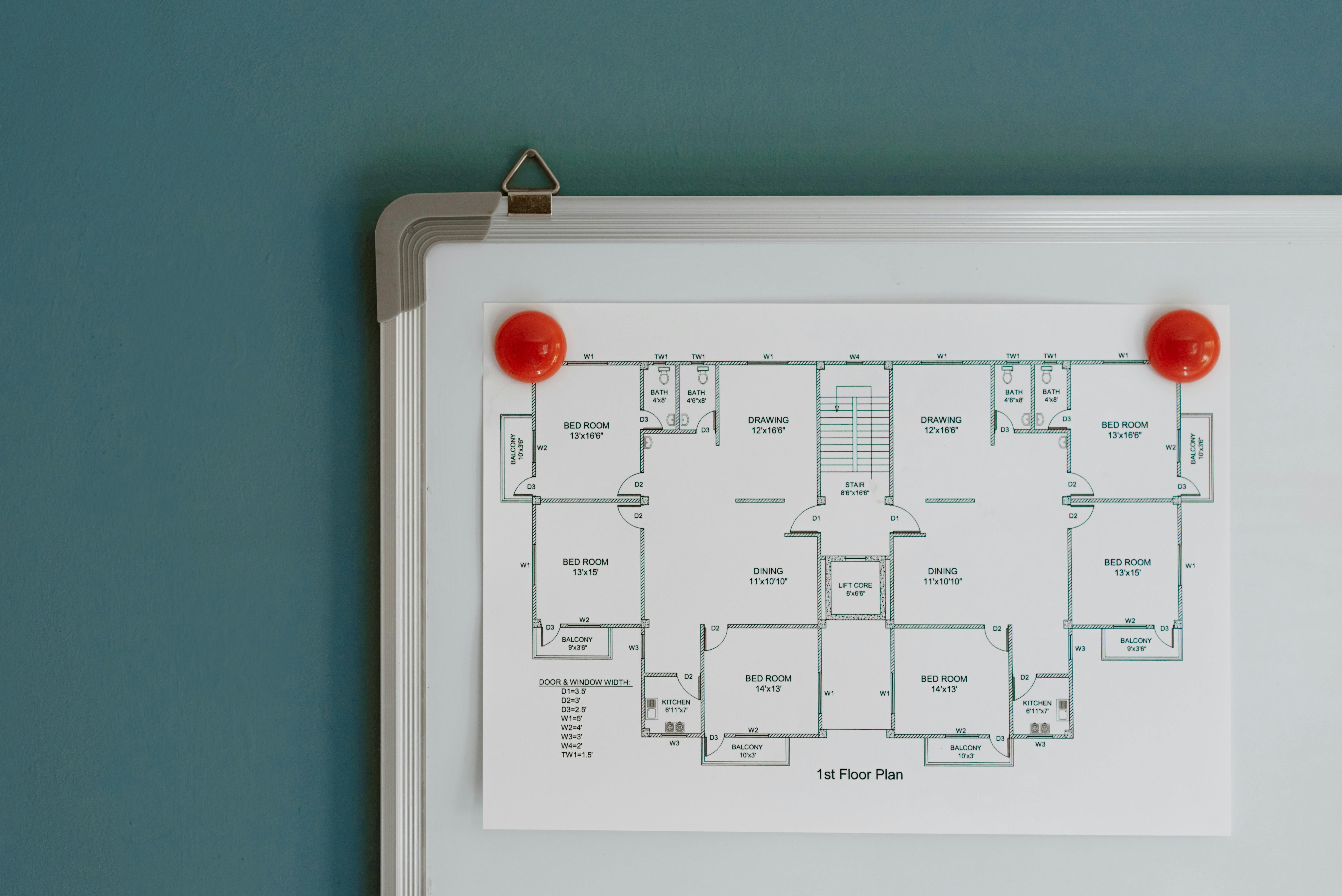 floor plan hanging on whiteboard