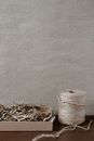 Desk with tying twine and crinkle paper filler