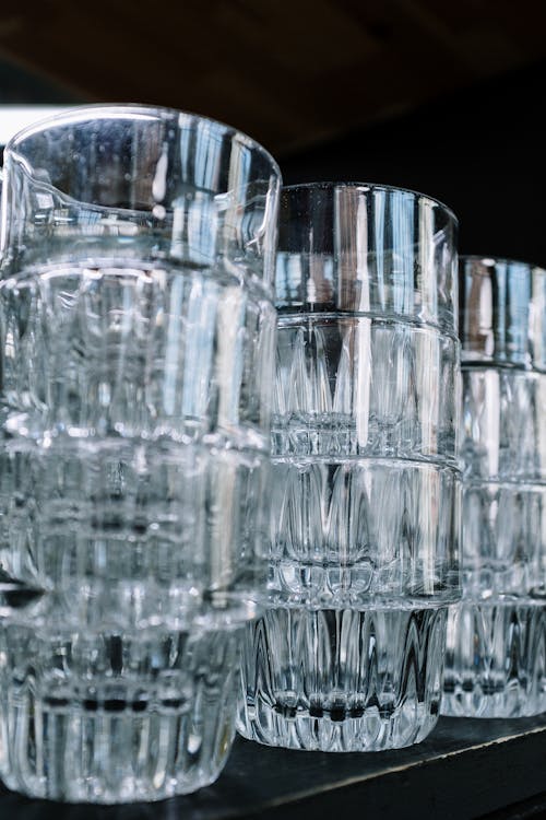 Clear Drinking Glasses on Black Surface