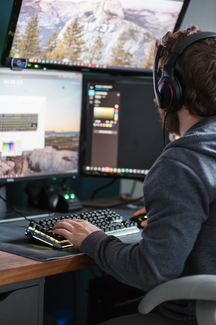 Crop Faceless Man Working On Modern Computer