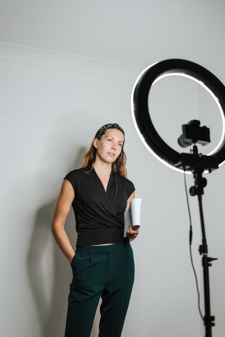 Stylish Woman Recording Video On Photo Camera