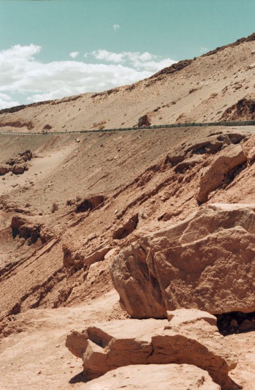 Free Stunning desert landscape with large rock formations under a clear blue sky. Stock Photo