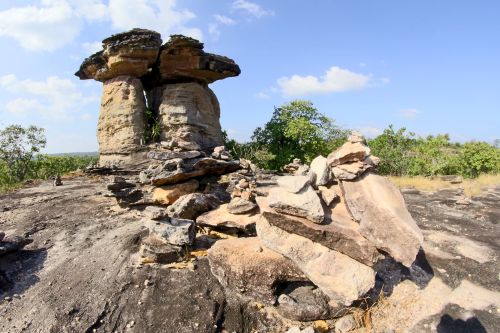 Free Explore stunning rock formations against a bright blue sky. Stock Photo