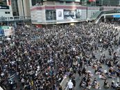 High angle of crowded street of city downtown gathered together to defend and resist Government