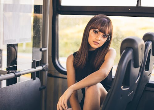 Trendy female during bus trip
