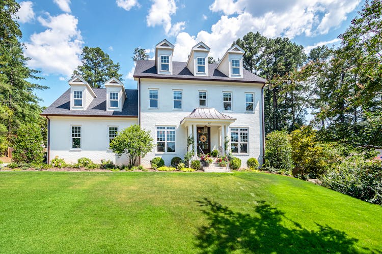 A Beautiful House Under Blue Sky