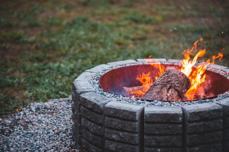 Stone fire pit in a backyard