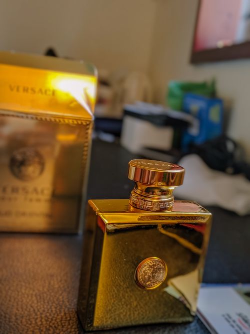 Free stock photo of versace cologne on a table Stock Photo