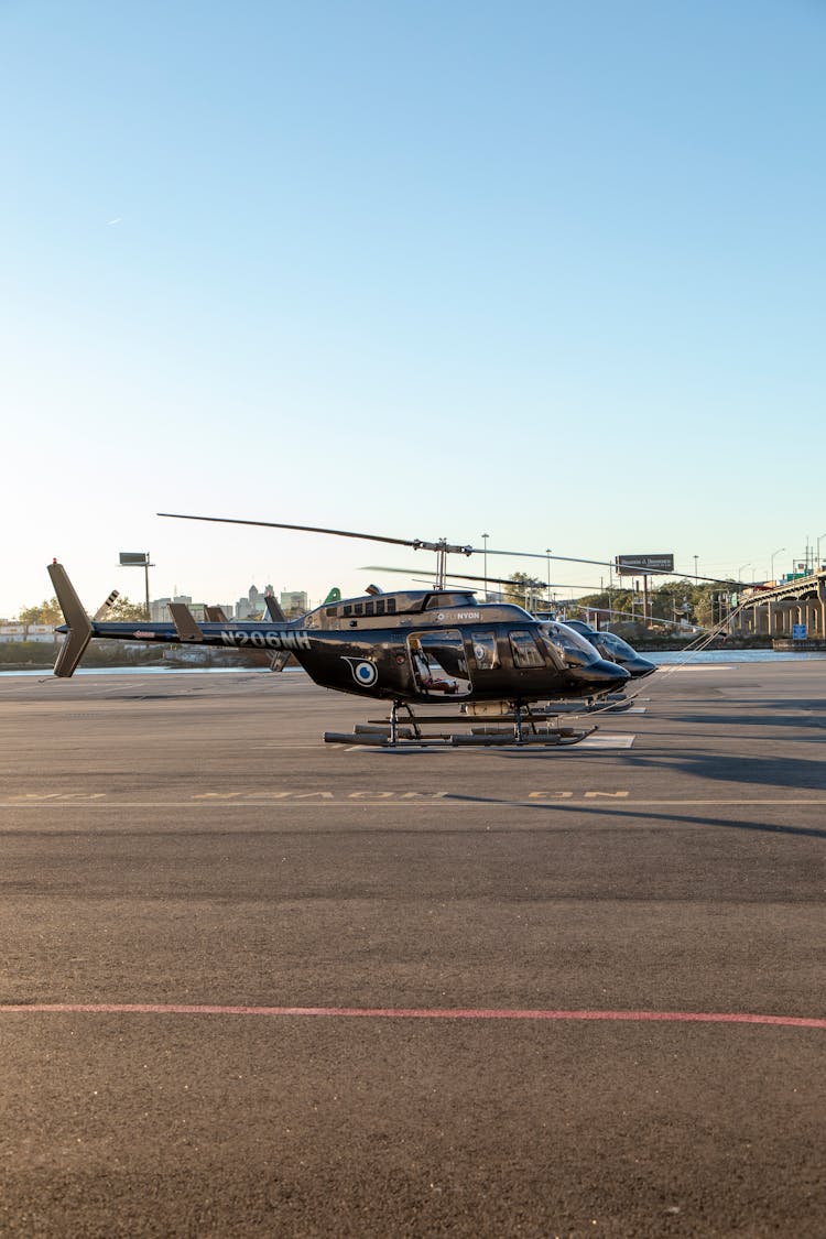 Helicopters On The Heliport Ground