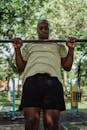 Man Working Out Using a Pull up Bar