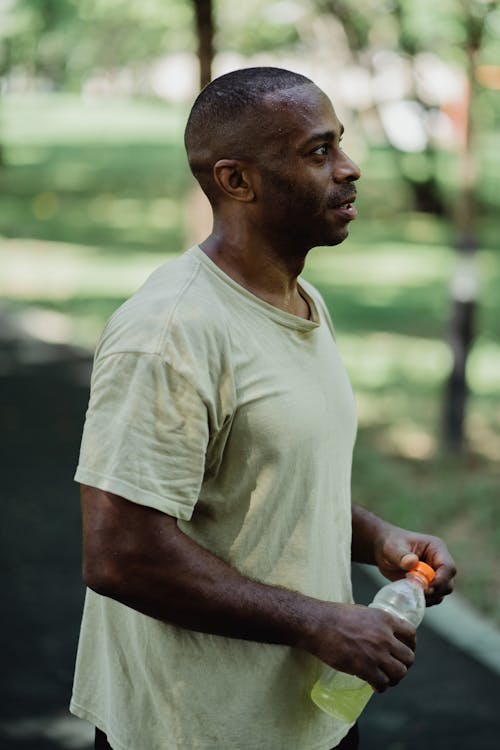 A Man Drinking an Energy Drink