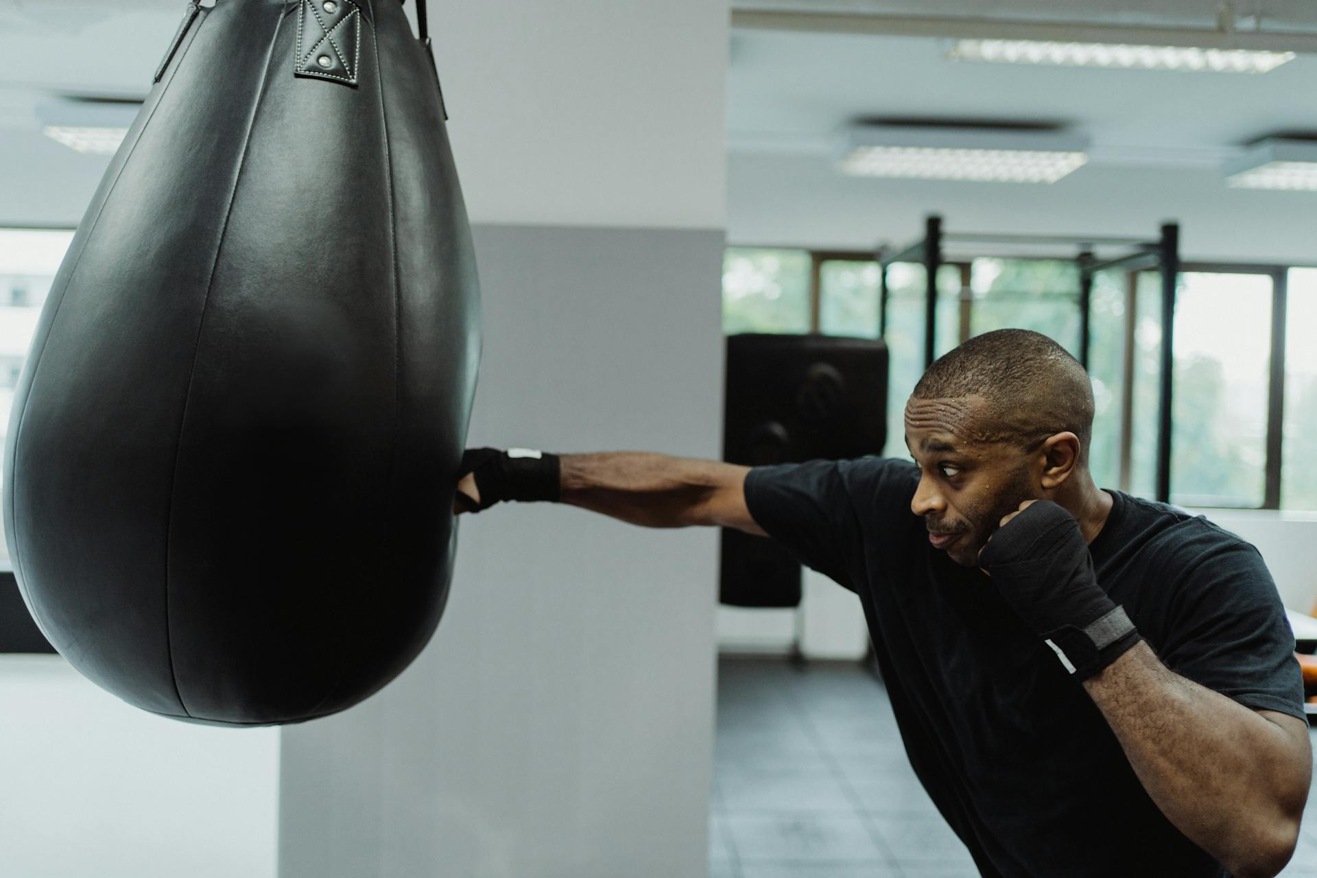 A Boxer Hitting a Punching