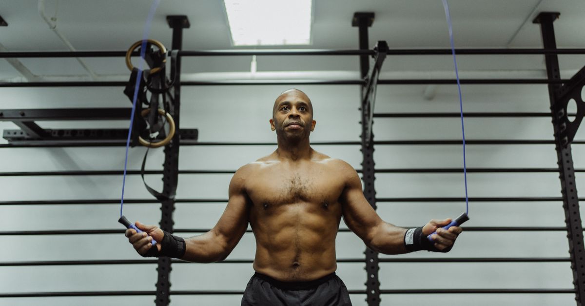 Man Using Jump Rope Model Man Using A Jumping Rope · Free Stock Photo