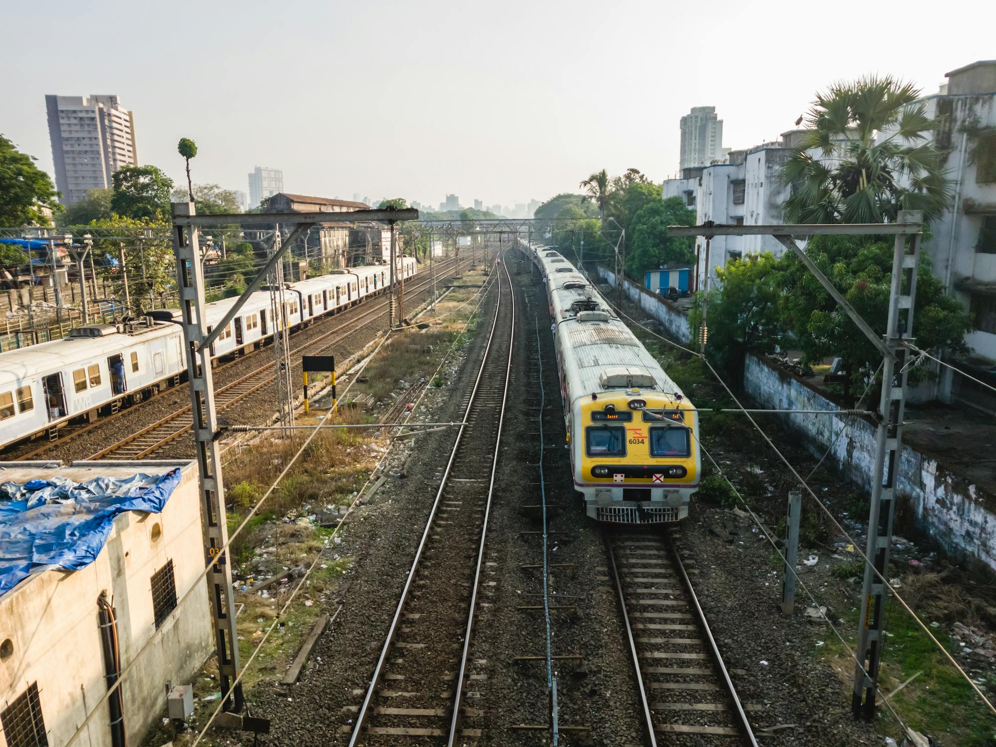 Mumbai Photo by Balaji Srinivasan from Pexels: https://www.pexels.com/photo/city-road-traffic-train-4805704/