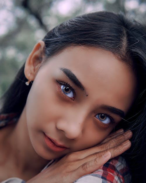 Woman With Black Hair and Red Lipstick